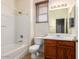 Clean bathroom with tub, shower, toilet and vanity at 4114 E Jasper Dr, Gilbert, AZ 85296