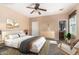 Relaxing bedroom with neutral color palette and ensuite bathroom access at 4114 E Jasper Dr, Gilbert, AZ 85296