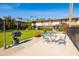 Community patio with BBQ grill and seating area at 4701 N 68Th St # 248, Scottsdale, AZ 85251