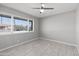 Second bedroom with tile floors and large windows at 4701 N 68Th St # 248, Scottsdale, AZ 85251