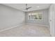 Bright bedroom features tile floors and ceiling fan at 4701 N 68Th St # 248, Scottsdale, AZ 85251