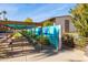 Community garden with covered seating and colorful mural at 4701 N 68Th St # 248, Scottsdale, AZ 85251