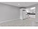 Open dining area with tile floors flows into the updated kitchen at 4701 N 68Th St # 248, Scottsdale, AZ 85251