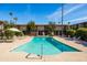 Inviting community pool with lounge chairs and patio umbrellas at 4701 N 68Th St # 248, Scottsdale, AZ 85251