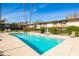 Refreshing community pool with surrounding patio furniture at 4701 N 68Th St # 248, Scottsdale, AZ 85251