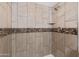 Updated shower with stone and tile detail at 4701 N 68Th St # 248, Scottsdale, AZ 85251
