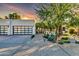 Modern home with two-car garage and landscaped front yard at 6521 N 4Th St, Phoenix, AZ 85012