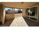 Covered patio with sliding glass doors leading to backyard at 7407 E Fillmore St, Scottsdale, AZ 85257