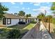 Large backyard with a long concrete water feature and plenty of space at 1101 N Christa Way, Tolleson, AZ 85353