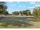 Spacious backyard with grassy area and storage shed at 1101 N Christa Way, Tolleson, AZ 85353