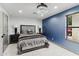 Comfortable bedroom with a plush bed, and stylish nightstands at 1101 N Christa Way, Tolleson, AZ 85353