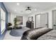 Cozy bedroom with a bed, dresser, and plenty of natural light at 1101 N Christa Way, Tolleson, AZ 85353