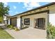 Home exterior with covered porch, landscaping, and front walkway at 1101 N Christa Way, Tolleson, AZ 85353