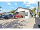 Detached garage with two jet skis and a truck at 1101 N Christa Way, Tolleson, AZ 85353
