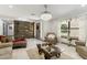 Elegant living room with a statement wall and plenty of natural light at 1101 N Christa Way, Tolleson, AZ 85353