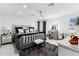 Spacious main bedroom with a large bed, plush carpet, and a vanity area at 1101 N Christa Way, Tolleson, AZ 85353