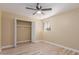 Bedroom with large closet and window coverings at 1340 N Recker Rd # 131, Mesa, AZ 85205