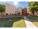 Condo building with manicured landscaping and walkway at 1340 N Recker Rd # 131, Mesa, AZ 85205