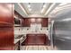 Modern kitchen with granite counters and stainless steel appliances at 1340 N Recker Rd # 131, Mesa, AZ 85205