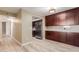 Modern kitchen with granite counters and dark wood cabinets at 1340 N Recker Rd # 131, Mesa, AZ 85205