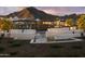 Modern water feature with stonework and landscaping, mountain view at 35176 N Lead Way, San Tan Valley, AZ 85144