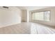 Living room with tile floors and large window at 4731 W New World Dr, Glendale, AZ 85302