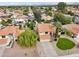 Aerial view of two-story house with tile roof, pool, and landscaped yard at 5544 E Paradise Ln, Scottsdale, AZ 85254
