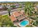 Aerial view of house with pool and backyard at 5544 E Paradise Ln, Scottsdale, AZ 85254