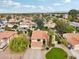 Aerial view of two-story house with tile roof, pool, and landscaped yard at 5544 E Paradise Ln, Scottsdale, AZ 85254