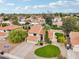 Aerial view of two-story house with tile roof, pool, and landscaped yard at 5544 E Paradise Ln, Scottsdale, AZ 85254