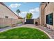 Landscaped backyard featuring a circular lawn at 5544 E Paradise Ln, Scottsdale, AZ 85254