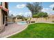 Spacious backyard with a pool and patio area at 5544 E Paradise Ln, Scottsdale, AZ 85254