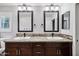 Double vanity bathroom with granite countertops and updated fixtures at 5544 E Paradise Ln, Scottsdale, AZ 85254