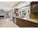 Modern kitchen with granite counters and stainless steel appliances at 5544 E Paradise Ln, Scottsdale, AZ 85254