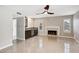 Open living room and wet bar area with tile flooring at 5544 E Paradise Ln, Scottsdale, AZ 85254