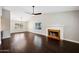 Spacious living room with hardwood floors, fireplace, and lots of natural light at 5544 E Paradise Ln, Scottsdale, AZ 85254