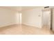 Large bedroom with tile floors and access to hallway at 8027 N 32Nd Ave, Phoenix, AZ 85051