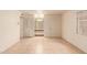 Spacious bedroom with mirrored closet doors and tile floors at 8027 N 32Nd Ave, Phoenix, AZ 85051