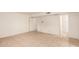 Bright bedroom with tiled floors and access to a bathroom at 8027 N 32Nd Ave, Phoenix, AZ 85051