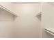 Double closet with hanging rods and shelving at 8027 N 32Nd Ave, Phoenix, AZ 85051