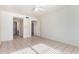 Spacious bedroom with tile floors and access to bathroom at 8201 N 21St Dr # C107, Phoenix, AZ 85021