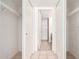 Bright hallway with mirrored closet doors and access to bathroom at 8201 N 21St Dr # C107, Phoenix, AZ 85021