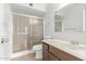Clean bathroom with shower/tub combo, vanity, and toilet at 8428 N 33Rd Dr, Phoenix, AZ 85051