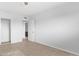 Bedroom with tile floors, ceiling fan, and access to bathroom at 8428 N 33Rd Dr, Phoenix, AZ 85051