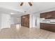 Bright dining area with tile flooring and wood accent wall at 8428 N 33Rd Dr, Phoenix, AZ 85051