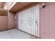 Ornate metal security door leading to garage at 8428 N 33Rd Dr, Phoenix, AZ 85051