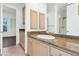 Bathroom with granite countertop and updated fixtures at 11615 E Terra Dr, Scottsdale, AZ 85259