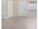 Clean entryway with laminate flooring and white doors at 1340 N Recker Rd # 256, Mesa, AZ 85205
