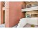 Building exterior showcasing a walkway and patio area at 1340 N Recker Rd # 256, Mesa, AZ 85205
