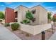 Building exterior showcasing landscaping and architectural details at 1340 N Recker Rd # 256, Mesa, AZ 85205